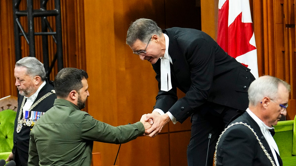Canadian House speaker shakes hands with Zelenskyy