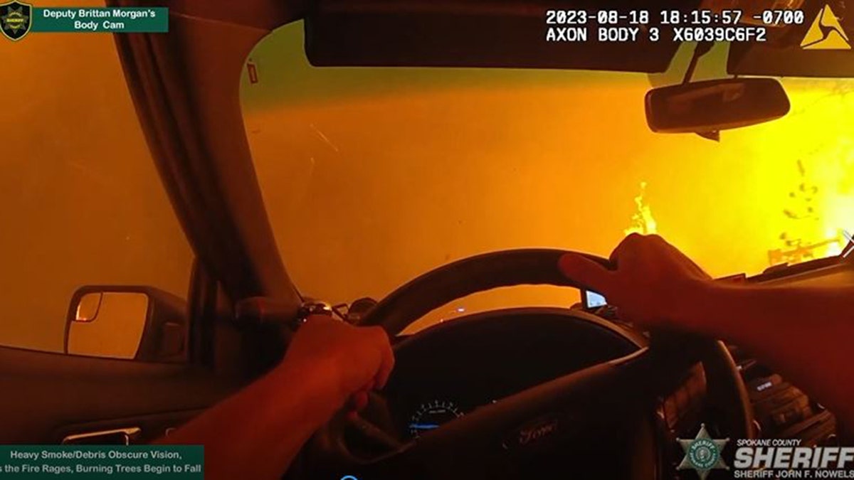 Spokane deputy drives through fire one