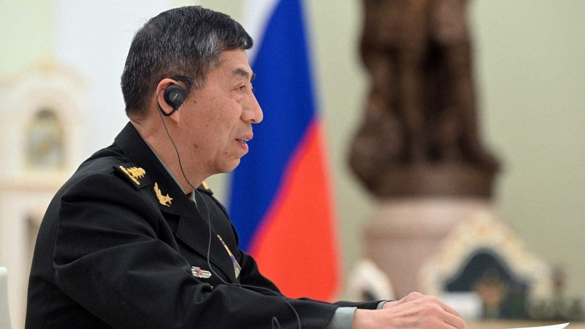 Li Shangfu shown from April meeting in Kremlin in Moscow