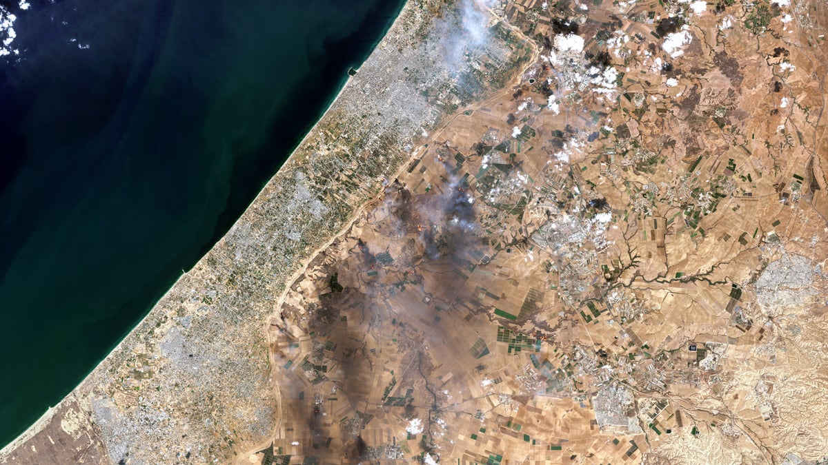 Smoke plumes along the Gaza-Israel border on Oct. 7, 2023