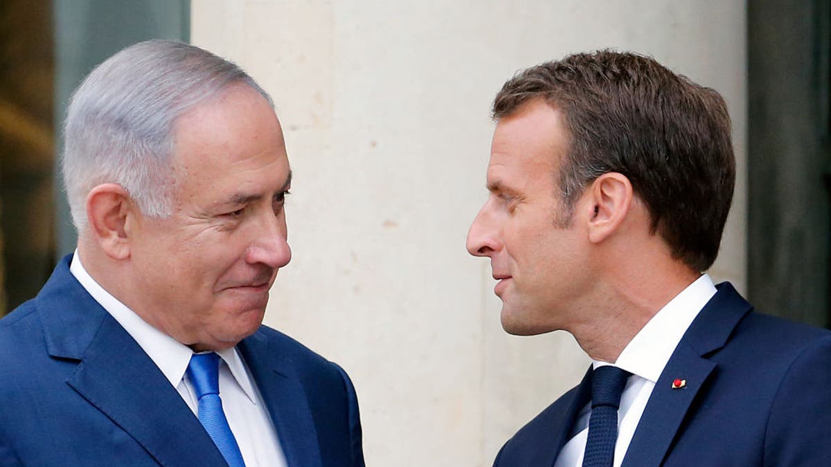Emmanuel Macron with Benjamin Netanyahu