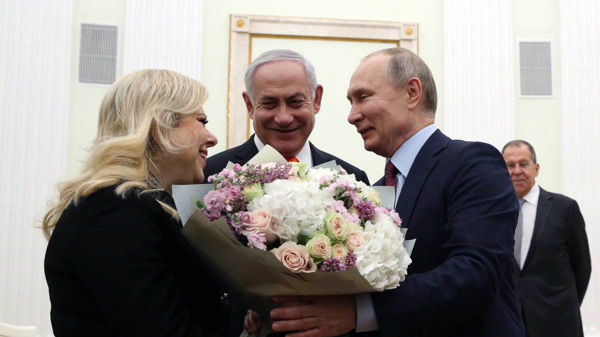 Putin meets the Netanyahus