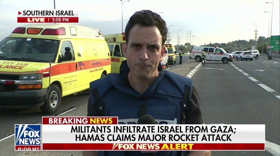 At least 100 killed in attack by Hamas in Israel