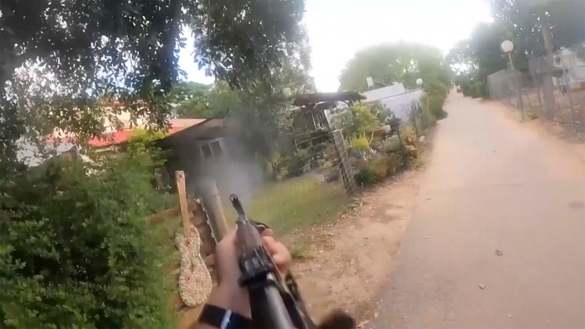 Hamas fighter holding a rifle in Israel