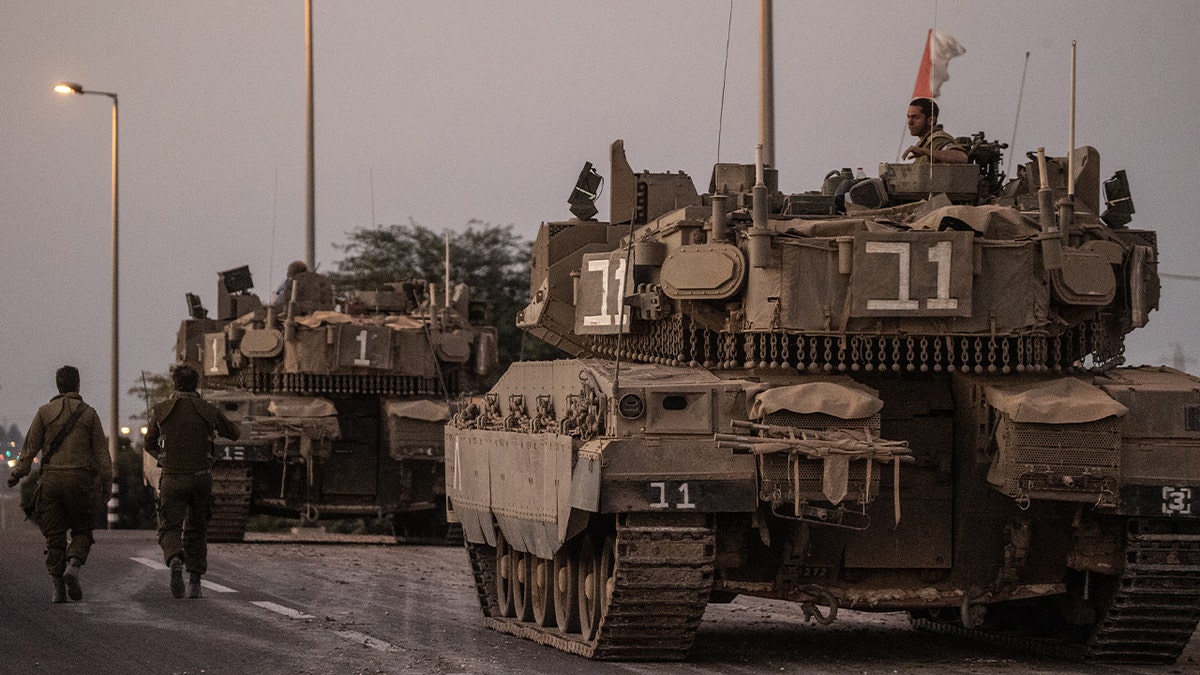 Israeli tanks, soldiers on the move