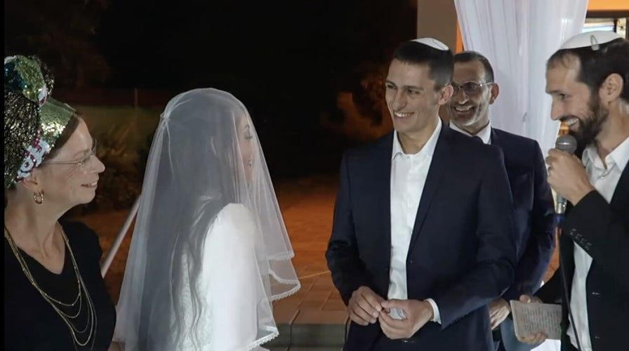 Israeli soldier celebrates wedding days after he's shot and his brother goes missing in action