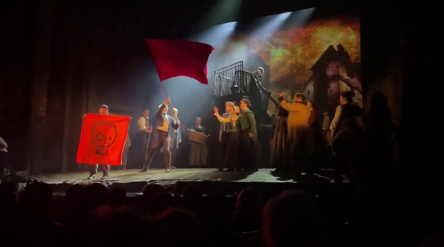 Climate protesters shut down Les Miserables performance in London