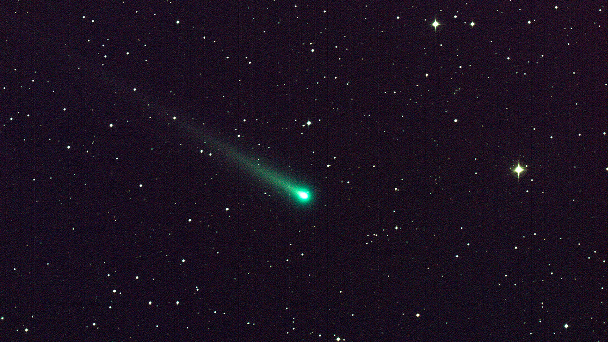 Bright green Comet blazes through night sky