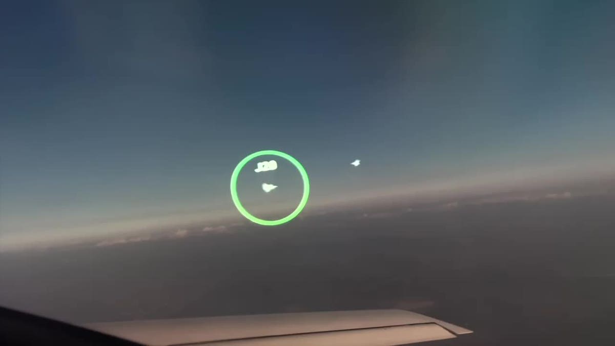 A friendly fighter jet is seen through Red 6's augmented reality-enabled helmet.