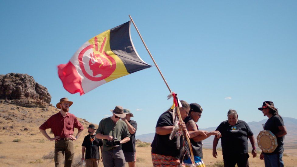 Tribe members gather by Sentinel Rock in Thacker Pass