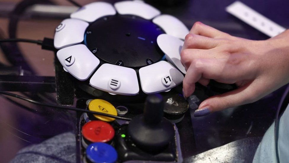 Close up of Access Controller showing different coloured buttons and a joystick