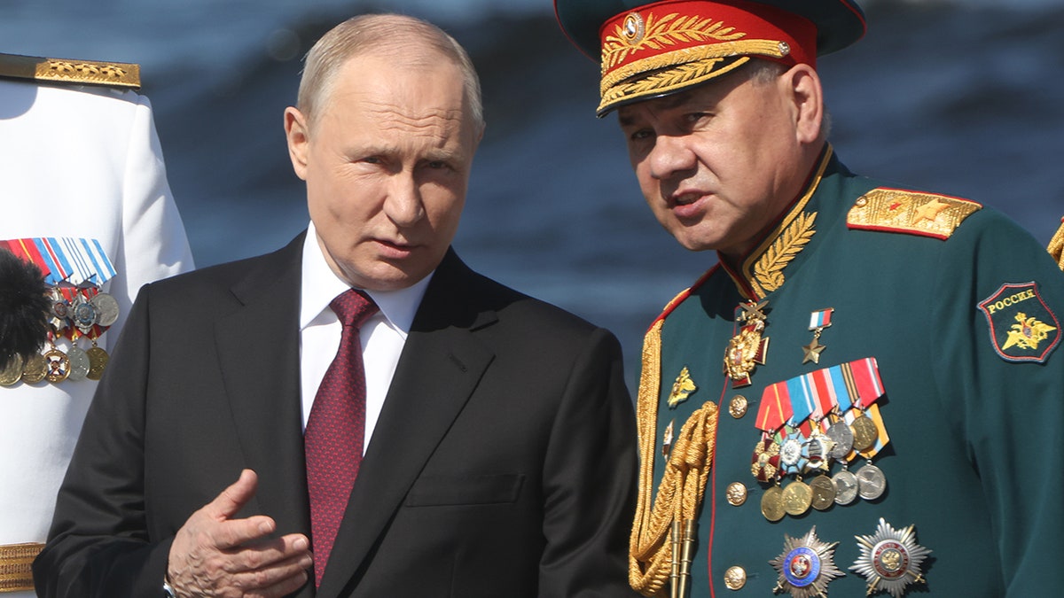 Russian President Vladimir Putin and Defense Minister Sergei Shoigu