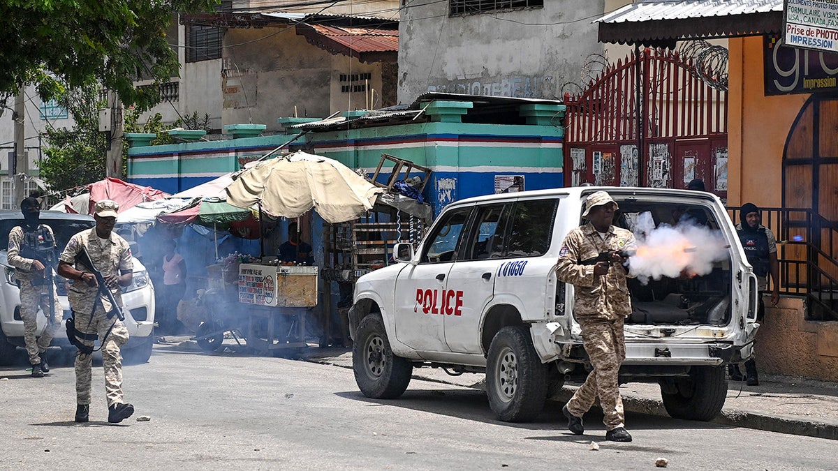 Haiti officers deploy tear gas