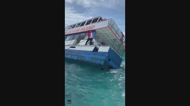 Bahamas tour boat passengers flee sinking vessel