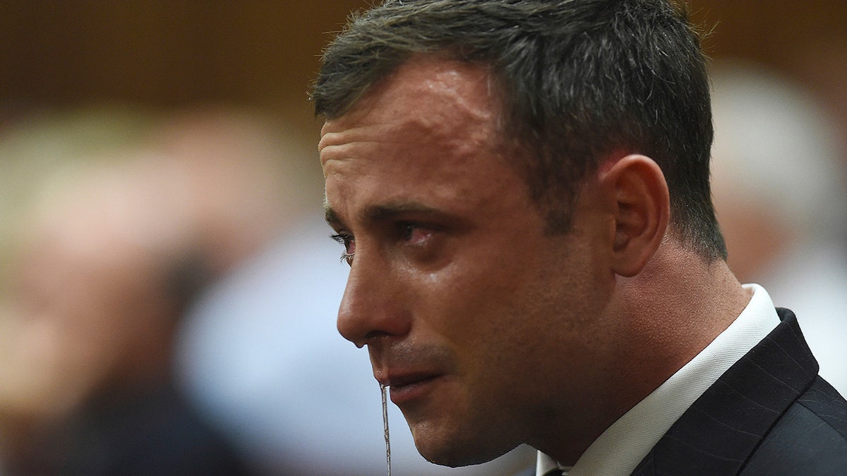 Oscar Pistorius weeping as snot drips from his nose.