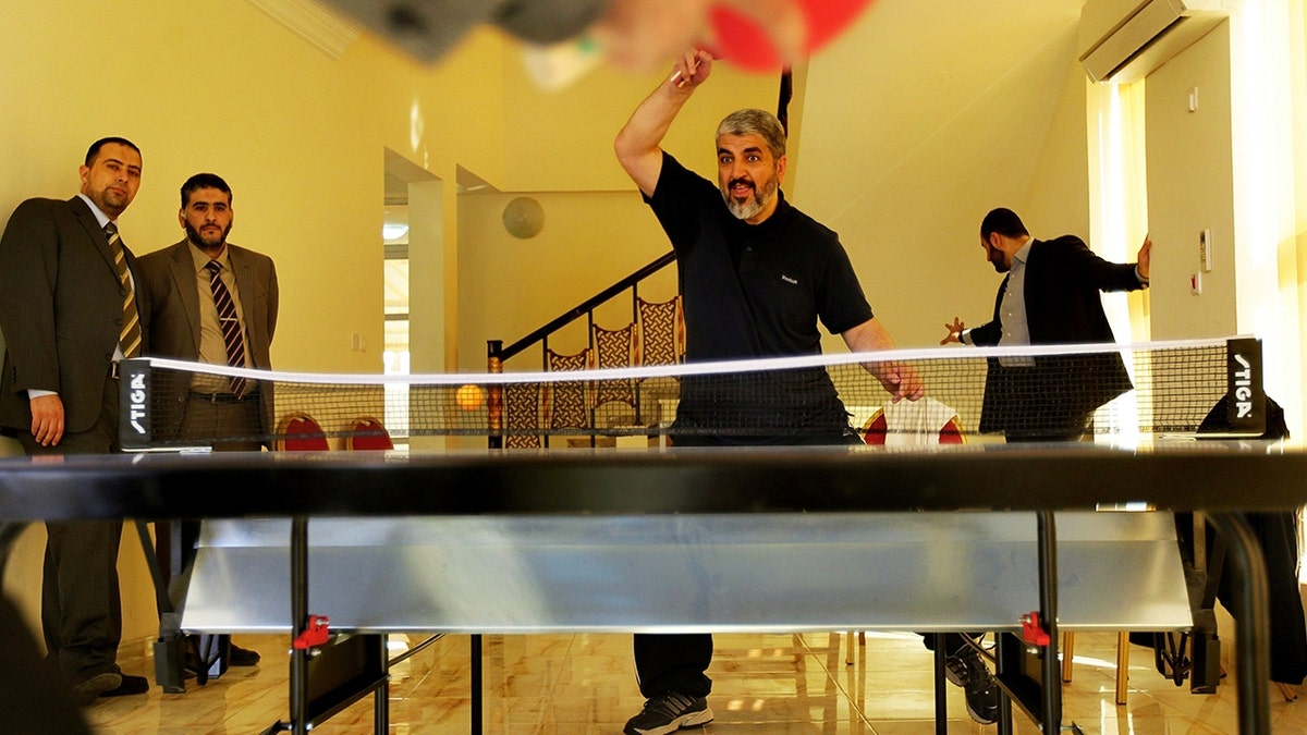 Hamas leader Khaled Mashal pictured playing ping pong. 