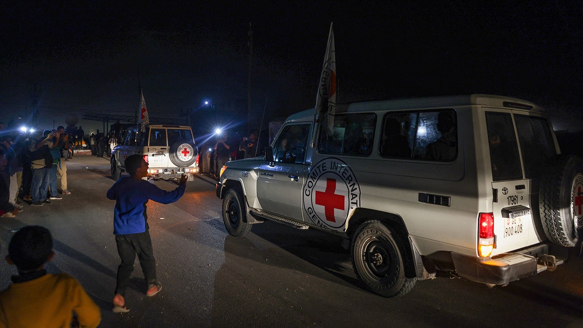 Israeli hostages transported in Red Cross ambulances