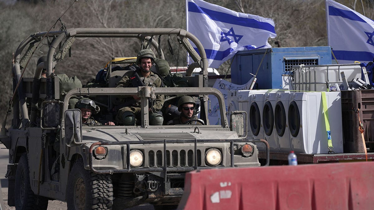 Israeli troops in vehicle near Gaza Strip