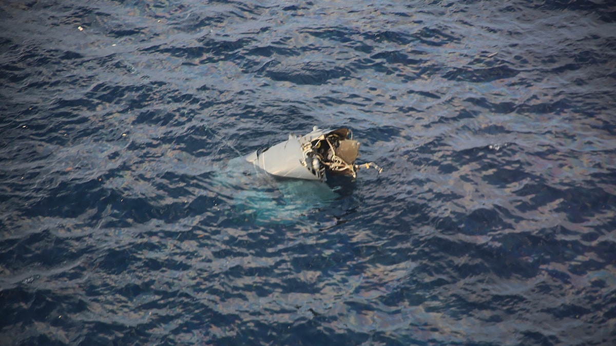 A piece of the aircraft in water