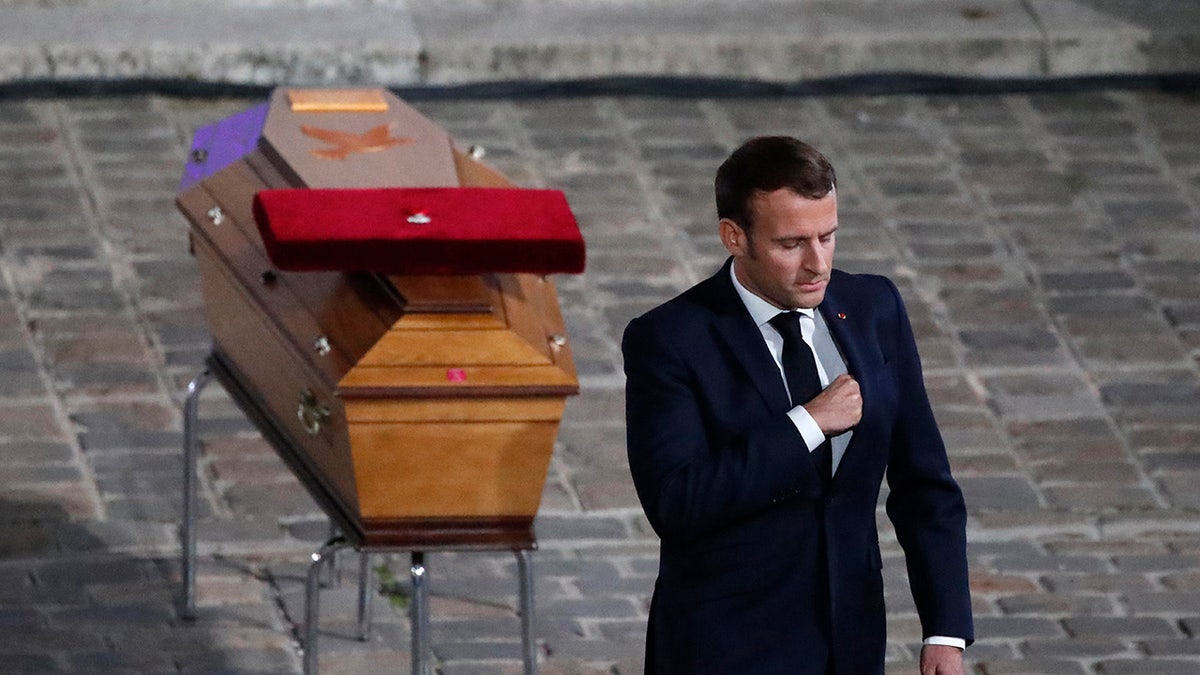 Macron leaves Samuel Paty coffin