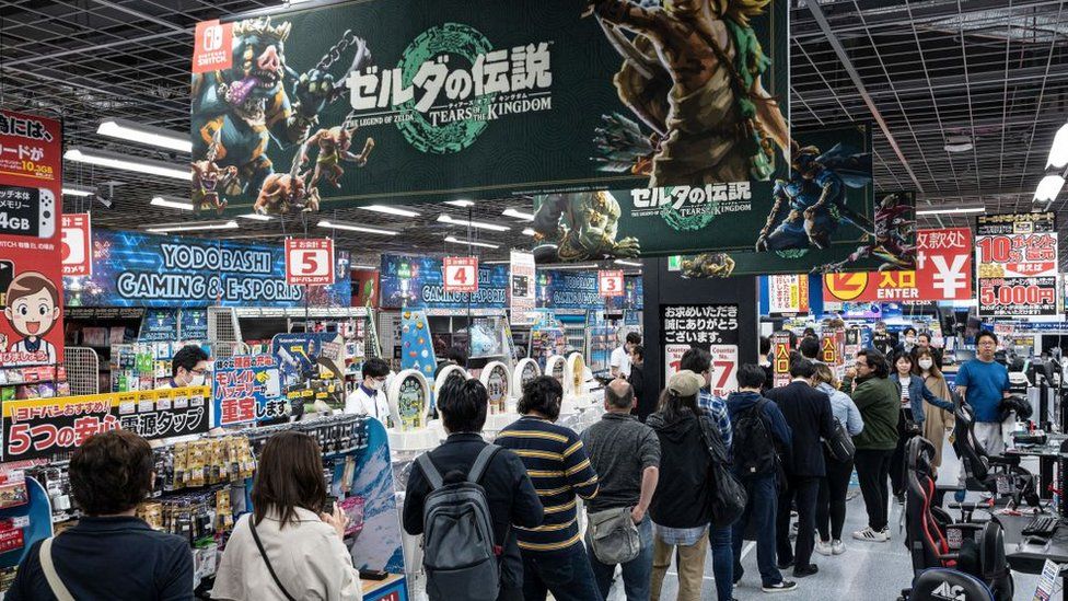 People queue up to buy Legend of Zelda game Tears of the Kingdom in Tokyo on May 12, 2023