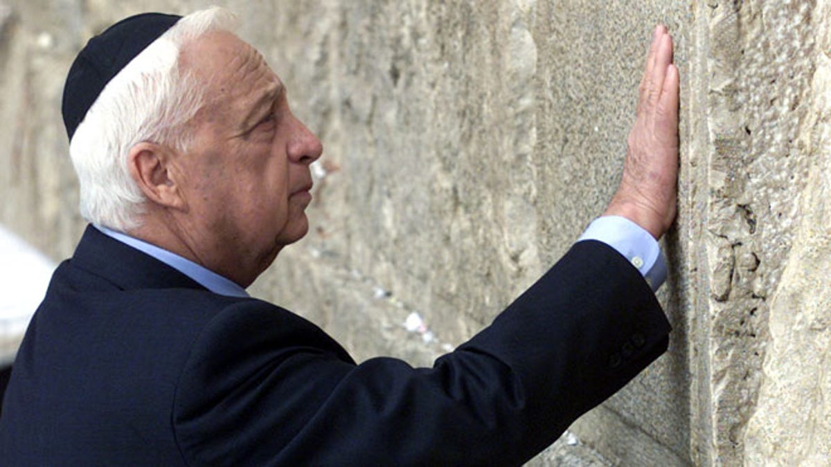 Ariel Sharon touching the Western Wall in Jerusalem