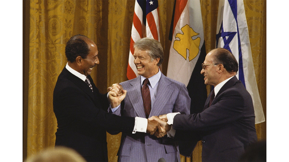 Anwar Sadat, U.S. President Jimmy Carter and Israeli Prime Minister Menachem Begin