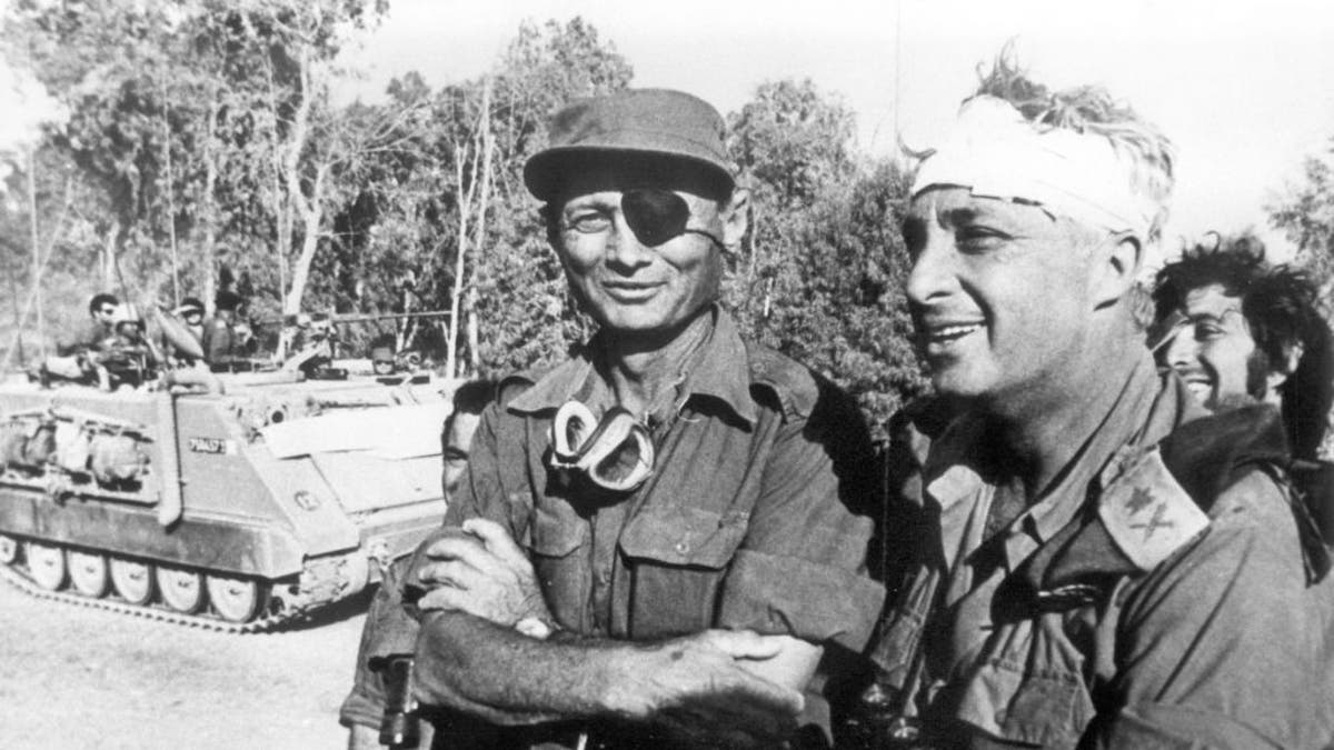 General Moshe Dayan and Ariel Sharon