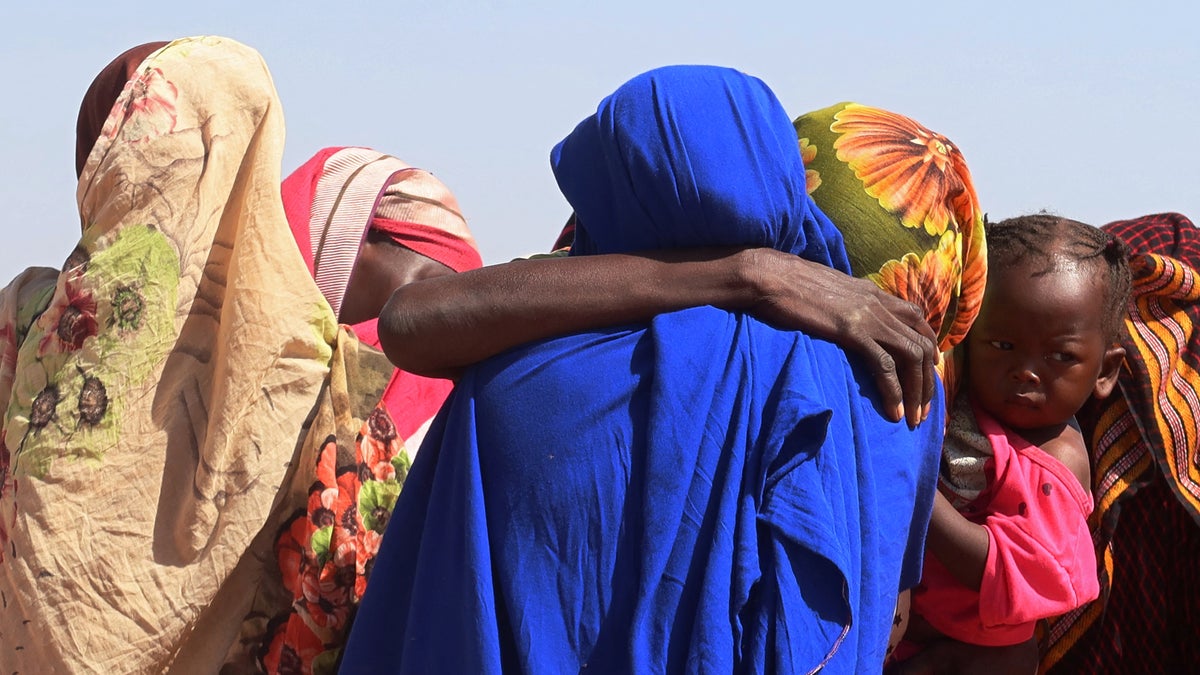 Women from El Geneina, West Darfur, weep