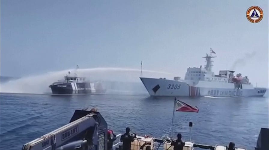 China blasts Philippine boat with water cannon, military says