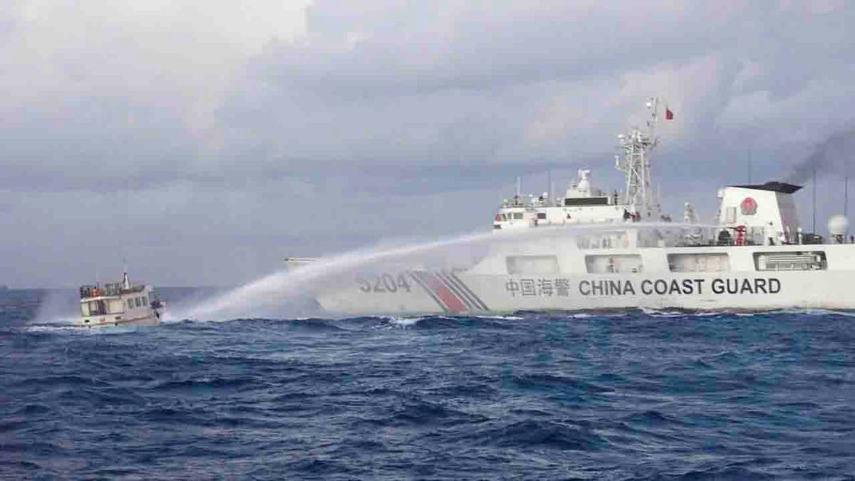 Chinese Coast Guard ship uses water cannons on Philippine navy-operated supply boat
