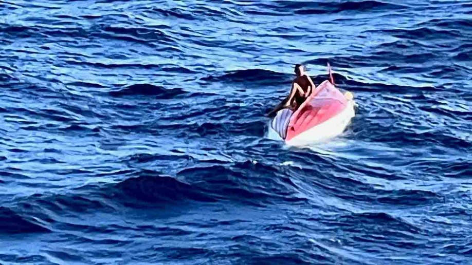 Tom Robinson spotted on capsized boat