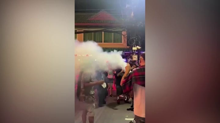 American forced to apologize after blowing cannabis smoke on busy street