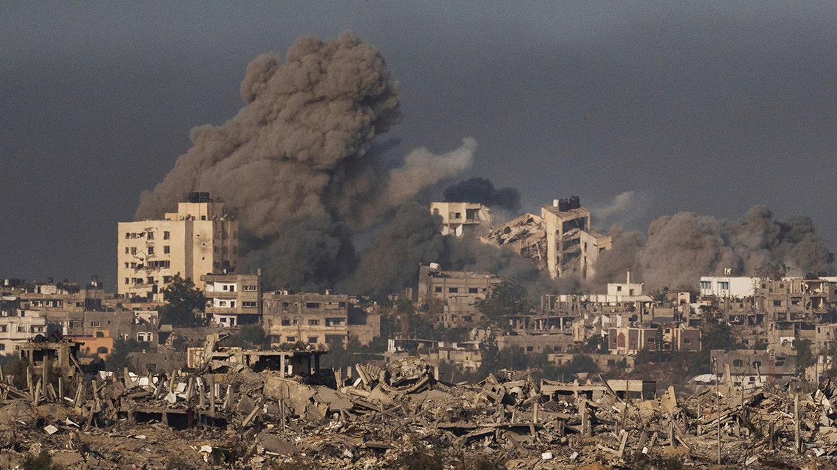 Several buildings, smoke in Gaza