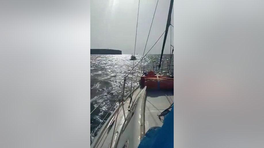 sailboat at sea during orca attack