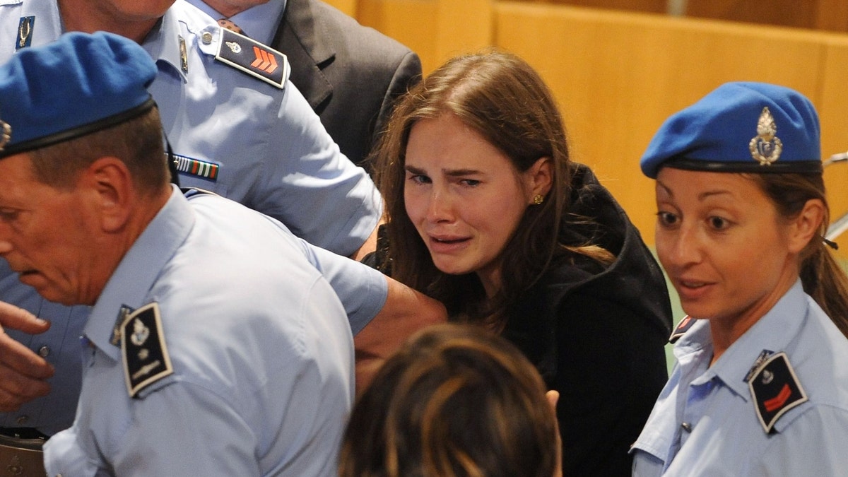 Amanda Knox cries after she is acquitted