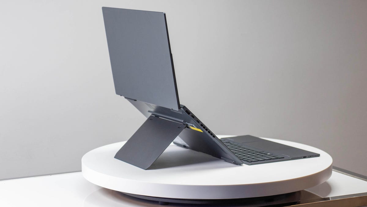 The rear of the dual-screen Asus Zenbook Duo rest on its wide kickstand that folds down from the base of the laptop.