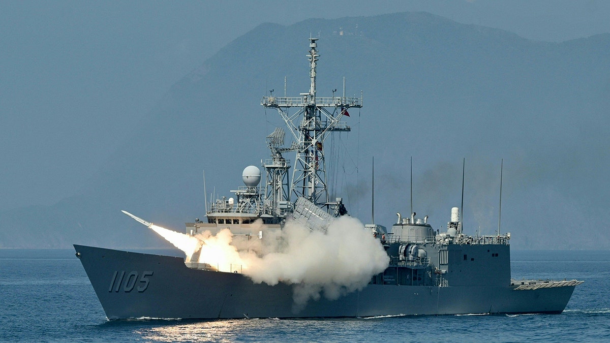 Taiwan navy ship launches missile during drill