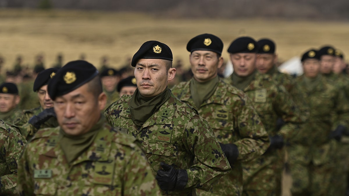 Japan soldiers in uniform, formed in a line