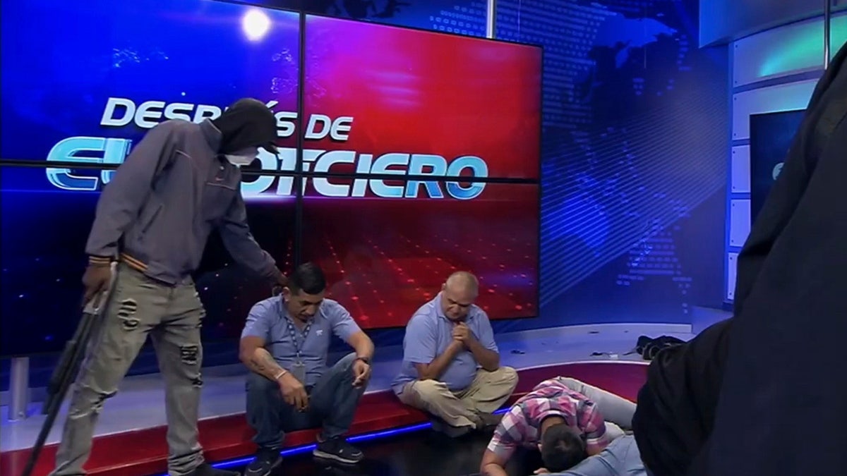 Ecuador gunmen hold TV station staffers at gunpoint