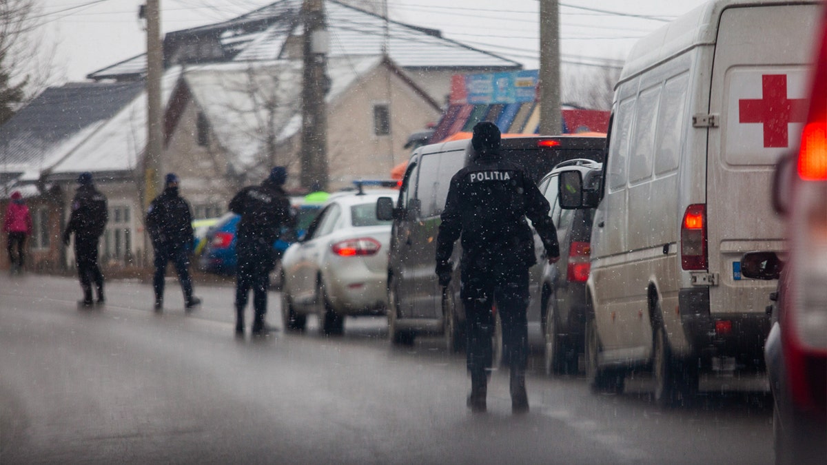 Police patrol as refugees cross from ukraine into romania