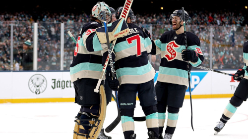  Joey Daccord of the Seattle Kraken celebrates with Jordan Eberle and Oliver Bjorkstrand.