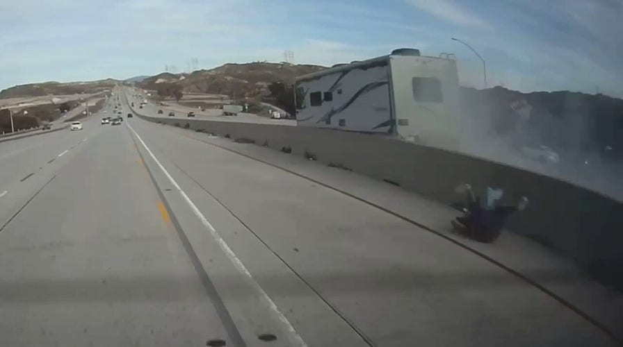 Man ejected from RV onto Southern California freeway survives