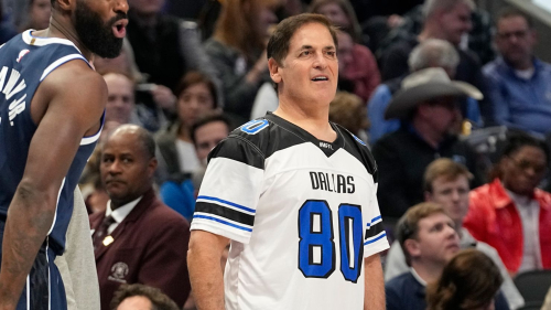 FILE - Dallas Mavericks owner Marc Cuban on the sidelines during the first half of an NBA basketball game against the Los Angeles Lakers in Dallas, Tuesday, Dec. 12, 2023. On Wednesday, Dec. 27, 2023, the NBA approved the sale of controlling interest of the Dallas Mavericks from Mark Cuban to the families that run the Las Vegas Sands casino company. (AP Photo/LM Otero, File)