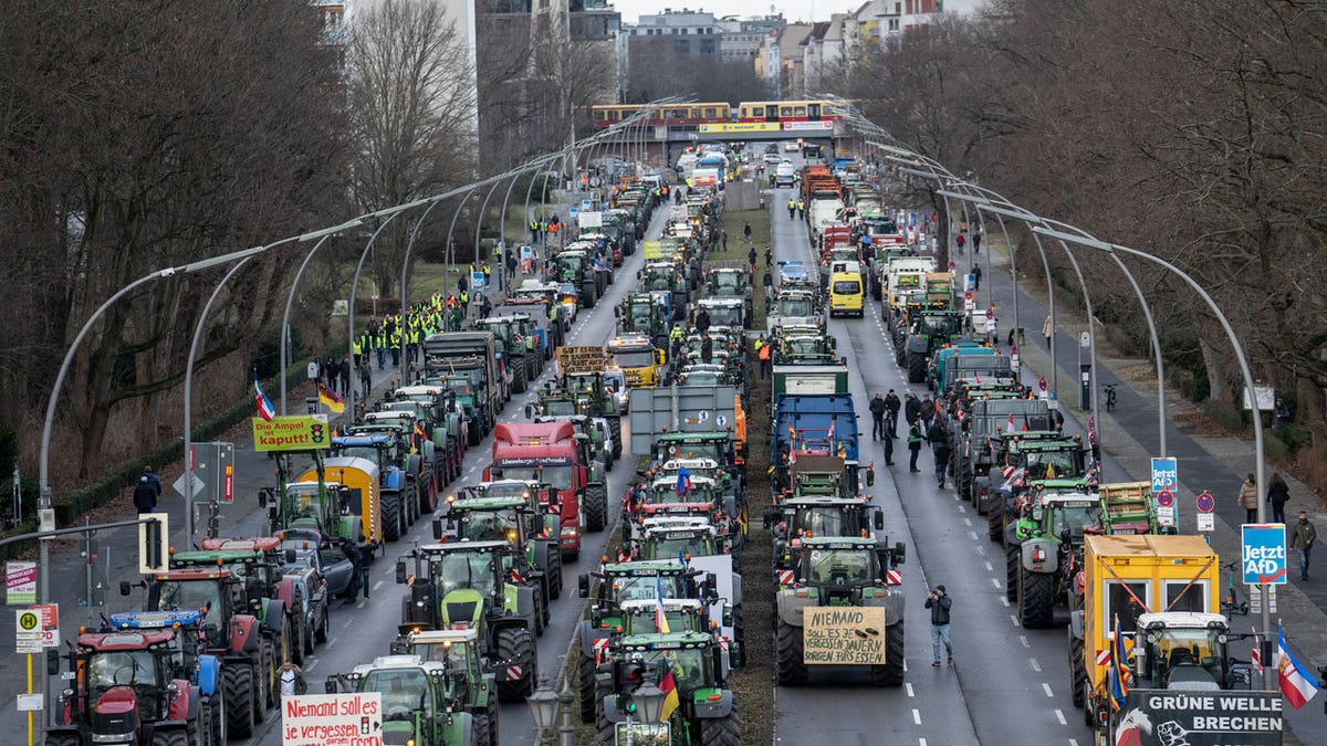 Farmers in Germany clog the streets of Berlin with their tractors in protest