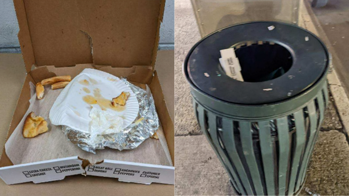 Pizza leftovers in a box discarded in a manhattan curbside trash can