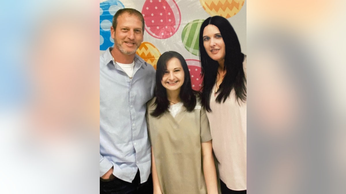 Gypsy Rose Blanchard poses in a prison uniform with her father and stepmother