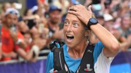 USA's Courtney Dauwalter reacts after winning the 170 km Mount Blanc Ultra Trail (UTMB) race around the Mont-Blanc crossing France, Italy and Swiss, on August 31, 2019 at the end of the race near Chamonix. (Photo by JEAN-PIERRE CLATOT / AFP)        (Photo credit should read JEAN-PIERRE CLATOT/AFP via Getty Images)