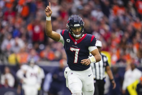 HOUSTON, TX - DECEMBER 03: C.J. Stroud #7 of the Houston Texans celebrates during an NFL football game against the Denver Broncos at NRG Stadium on December 3, 2023 in Houston, Texas. (Photo by Cooper Neill/Getty Images)