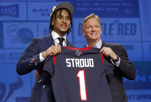 KANSAS CITY, MISSOURI - APRIL 27: (L-R) C.J. Stroud poses NFL Commissioner Roger Goodell after being selected second overall by the Houston Texans during the first round of the 2023 NFL Draft at Union Station on April 27, 2023 in Kansas City, Missouri. (Photo by David Eulitt/Getty Images)